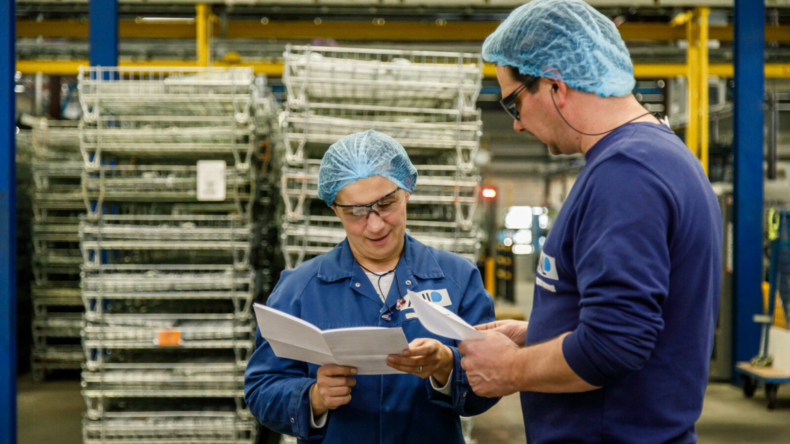 colleagues going over plans colleagues going over plans